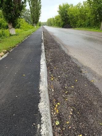 Воронежская область, город Эртиль. Обустройство пешеходной зоны на участке автомобильной дороги Эртиль – Шукавка – Большой Самовец завершено (к информации о выполнении поручения по итогам личного приема граждан, проведенного А.В.Ерёминым 04.07.2024.)