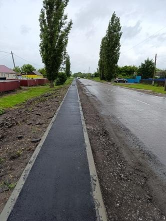 Воронежская область, город Эртиль. Обустройство пешеходной зоны на участке автомобильной дороги Эртиль – Шукавка – Большой Самовец завершено (к информации о выполнении поручения по итогам личного приема граждан, проведенного А.В.Ерёминым 04.07.2024.)